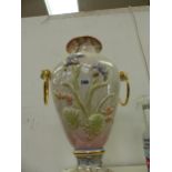 A GLAZED POTTERY DECORATIVE VASE.