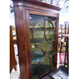 A GEORGE III MAHOGANY GLAZED CORNER CABINET. H 113 W 82 D 50cms