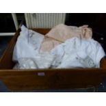 A BOX OF VARIOUS LINENS AND TEXTILES.