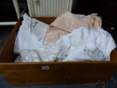 A BOX OF VARIOUS LINENS AND TEXTILES.
