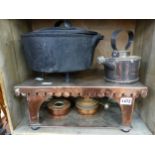 A COPPER WARMING STAND, A PLATED SPIRIT KETTLE AND A CAST IRON PAN