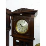 AN EARLY 20th CENTURY OAK LONG CASED GRANDFATHER CLOCK WITH EIGHT DAY CHIMING MOVEMENT. H 183 W 48 D