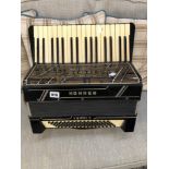 A HOHNER ACCORDIAN