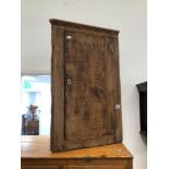 A GEORGIAN COUNTRY OAK CORNER CABINET.