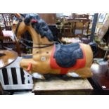 A VINTAGE RIDE ON HORSE TOY