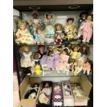 A COLLECTION OF CONTEMPORARY PORCELAIN HEADED DOLLS BY ASHTON DRAKE, LEONARDO, EFFNER AND OTHERS