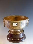 A SILVER ROSE BOWL BY HARRODS STORES LTD, LONDON 1911, THE HAMMERED BODY WITH LION MASK AND RING