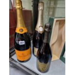 CHAMPAGNE: A BOXED BOTTLE OF 1988 DOM PERIGNON TOGETHER WITH MAGNUMS OF NON VINTAGE VEUVE CLIQUOT