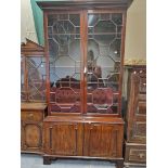 A GEORGIAN MAHOGANY DISPLAY CABINET, THE UPPER HALF WITH ASTRAGAL GLAZED DOORS OVER SHELVING THE