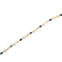 A HALLMARKED 9ct GOLD, DIAMOND AND SAPPHIRE LINE BRACELET. LENGTH 18cms. WEIGHT 5.44grms.