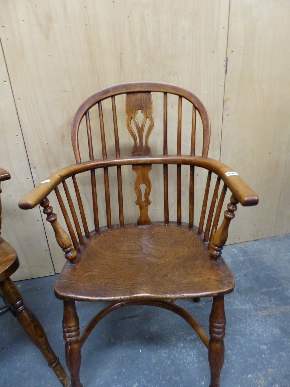 A 19th C. OAK AND ELM LOW BACKED WINDSOR CHAIR WITH CRINOLINE STRETCHER TOGETHER WITH ANOTHER WITH A - Image 5 of 6