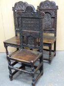 A PAIR OF ANTIQUE STYLE 17th C. OAK CHAIRS TOGETHER WITH ANOTHER CRESTED BY A A MASK