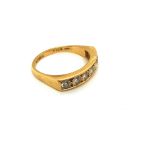 AN 18ct HALLMARKED GOLD AND DIAMOND SEVEN STONE HALF ETERNITY RING. DIAMOND MEASUREMENTS APPROX 3.