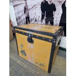 A LOUIS VUITTON BRASS STUDDED LEATHER COVERED CABIN TRUNK. WITH RELINED INTERIOR