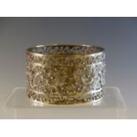 A CHINESE GLASS LINED SILVER CYLINDRICAL BOWL BY WANG HING, THE SIDES PIERCED AND WORKED WITH