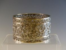 A CHINESE GLASS LINED SILVER CYLINDRICAL BOWL BY WANG HING, THE SIDES PIERCED AND WORKED WITH
