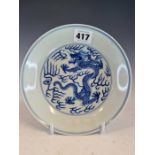 A CHINESE BLUE AND WHITE PLATE PAINTED WITH A DRAGON CHASING A FLAMING PEARL, SIX CHARACTER MARK.