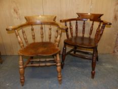 TWO ANTIQUE OAK AND ELM CAPTAINS CHAIRS