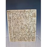 A TIBETAN ELEPHANT TOOTH PANEL CARVED WITH AN ASTROLOGICAL CALENDAR OR KALACHAKRA, THE WHEEL