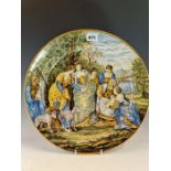 A 19th C. ITALIAN MAIOLICA DISH, PAPER LABELLED CASTELLI, PAINTED WITH THE DISCOVERY OF MOSES IN THE