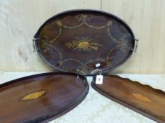 THREE MAHOGANY GALLERIED TWO HANDLED TRAYS, TWO INLAID WITH CENTRAL CONCH SHELLS AND THE THIRD