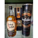 WHISKY: A BOXED LITRE BOTTLE OF GLENFIDDICH MALT WHISKY, A BOXED LITRE BOTTLE OF FAMOUS GROUSE