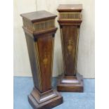 A PAIR OFLATE 19th C. MAHOGANY COLUMNS,THE SQUARE TOPS ABOVE EBONY BATON BANDS ON SATIN WOOD GROUNDS