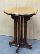 AN ARTS AND CRAFTS WALNUT OCTAGONAL TABLE, THE FOUR LEGS SUPPORTING THE CENTRE OF THE UNDERSIDE
