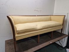 A MAHOGANY SHOW FRAME SETTEE, THE RECTANGULAR BACK AND ARMS ABOVE SQUARE SECTIONED LEGS TAPERING