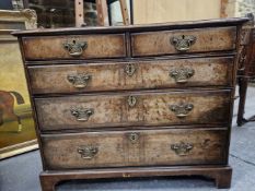 A GEORGE III CROSS BANDED MAHOGANY CHEST OF FOUR GRADED DRAWERS ON BRACKET FEET. W 92 x D 54 x H