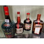 LIQUEURS: BOTTLES OF DRAMBUIE, COINTREAU, AMARULA, GRAND MARNIER AND TIA MARIA TOGETHER WITH A BOXED