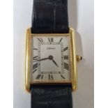 A VINTAGE SWISS DeLANEAU WRISTWATCH. THE CASE STAMPED 18k AND .750 AND ASSESSED AS 18ct GOLD. ON A