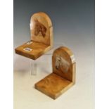A PAIR OF MAPLE BOOKENDS PAINTED WITH HORSES HEADS ON THE ROUND ARCH UPRIGHTS