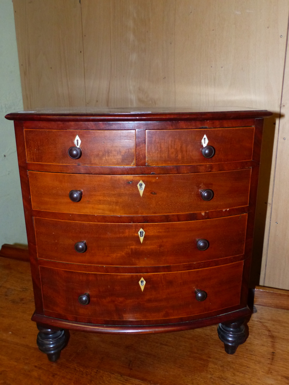A 19th C. MAHOGANY MINIATURE BOW FRONT CHEST OF TWO SHORT AND THREE GRADED LONG DRAWERS, EACH WITH - Image 5 of 6