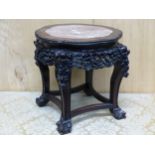 A CHINESE MARBLE TOPPED HARD WOOD STAND, THE WAVY CIRCULAR TOP WITH A BEAD CARVED EDGE, THE APRON