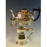 A SILVER HALF PINT BALUSTER MUG, LONDON 1921, 198Gms., A SILVER MOUNTED GLASS INKWELL AND A