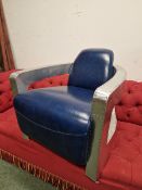 A VINTAGE 1950'S STYLE ALLOY AVIATION INSPIRED RETRO ARMCHAIR
