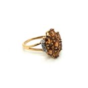 A 9ct HALLMARKED GOLD GEMSET AND DIAMOND MODERN DRESS RING. FINGER SIZE S. WEIGHT 5.22grms.