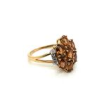 A 9ct HALLMARKED GOLD GEMSET AND DIAMOND MODERN DRESS RING. FINGER SIZE S. WEIGHT 5.22grms.