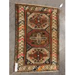 AN ANTIQUE CAUCASIAN RUG. 151 x 103cms