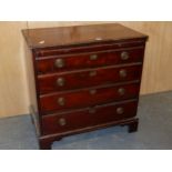A GEORGE III MAHOGANY CHEST WITH A BRUSHING SLIDE ABOVE FOUR GRADED LONG DRAWERS ON BRACKET FEET.