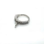 AN 18ct HALLMARKED WHITE GOLD AND DIAMOND ZIP RING. APPROX STATED ESTIMATED DIAMOND WEIGHT 1.