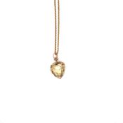 AN ANTIQUE GEM SET HEART PENDANT WITH A WREATH OF LEAVES AND FLOWERS SUSPENDED FROM A TRACE CHAIN