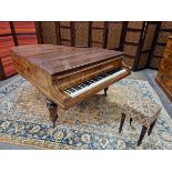 A VICTORIAN WALNUT CASED BABY GRAND PIANO ON THREE OCTAGONAL LEGS TAPERING TO BRASS CASTER FEET BY