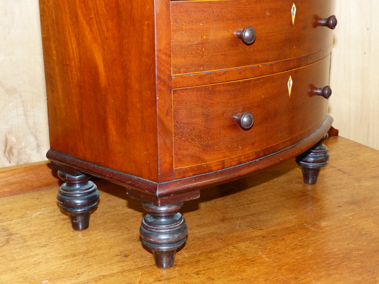 A 19th C. MAHOGANY MINIATURE BOW FRONT CHEST OF TWO SHORT AND THREE GRADED LONG DRAWERS, EACH WITH - Image 4 of 6