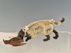 AN AUSTRIAN COLD PAINTED BRONZE SPANIEL RETRIEVING A COCK PHEASANT. W 10cms. TOGETHER WITH ANOTHER