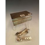A SILVER ASHTRAY, CHESTER 1909, 101Gms. TOGETHER WITH A SILVER CIGARETTE BOX, LONDON 1955, TWELVE