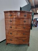 A 19th C. MAHOGANY BOW FRONT CHEST OF TWO SHORT AND FOUR GRADED LONG DRAWERS N BRACKET FEET. W 11