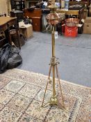A VICTORIAN AND LATER BRASS STANDARD LAMP, THE COPPER OIL RECEIVER NOW FITTED FOR ELECTRICITY, THE