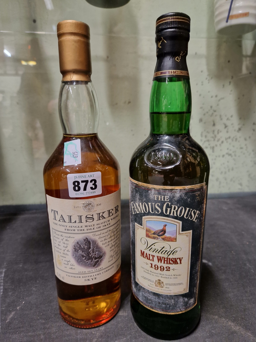 WHISKY: A BOTTLE OF TALISKER MALT WHISKY TOGETHER WITH A 1992 BOTTLE OF FAMOUS GROUSE MALT WHISKY